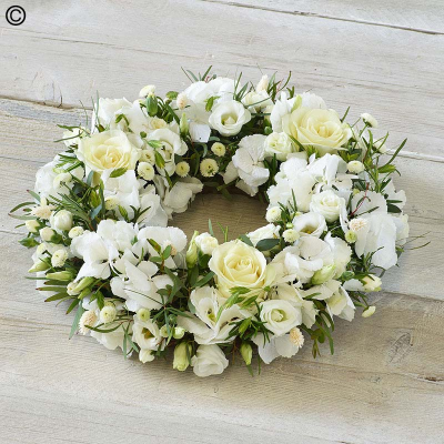 Opulent White Wreath - A profusion of white blooms, this elegant wreath features the finest hydrangeas, fragrant rosemary and dried lagarus 'bunny tails'.

The image shows Large Size

Please note: for seasonal and other supply reasons, we may occasionally substitute some of the blooms shown in the image. We will always try to be true to the bouquet's colour coordination, style, and shape and guarantee to give you the full value paid. If you have any queries, please email or call us and we would be delighted to confirm availability and explain alternatives. See the 'Contact Us' section.