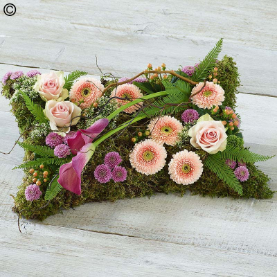 Woodland Pillow - A vibrant posy featuring germini, roses, carnations and alstroemeria in rich shades.

Please note: for seasonal and other supply reasons, we may occasionally substitute some of the blooms shown in the image. We will always try to be true to the bouquet's colour coordination, style, and shape and guarantee to give you the full value paid. If you have any queries, please email or call us and we would be delighted to confirm availability and explain alternatives. See the 'Contact Us' section.
