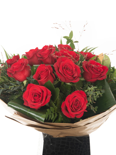Red Roses - Long-stemmed red roses beautifully arranged, wrapped, and delivered in our signature bag with flower food and care instructions.