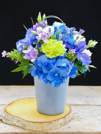 Baby Boy Floral Arrangement - Baby Boy Blue Floral Arrangement is designed by our top Florists, the perfect gift to welcome a baby boy. 

 

Please note: for seasonal and other supply reasons we may, from time to time, substitute some of the blooms shown in the image. We will always try to be true to the colour co-ordination, style and shape of the bouquet and will always guarantee to give you the full value paid. If you have any queries, please email or call us and we would be delighted to confirm availability and or explain alternatives. See 'contact us' section.