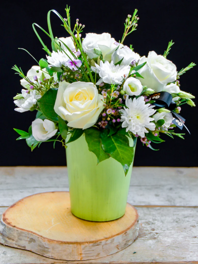 Graceful Floral Arrangement - A stunning arrangement of luxurious flowers in a white & cream colourway. Made to impress in a stylish vase.

Please note: for seasonal and other supply reasons, we may occasionally substitute some of the blooms shown in the image. We will always try to be true to the bouquet's colour coordination, style, and shape and guarantee to give you the full value paid. If you have any queries, please email or call us and we would be delighted to confirm availability and explain alternatives. See the 'Contact Us' section.