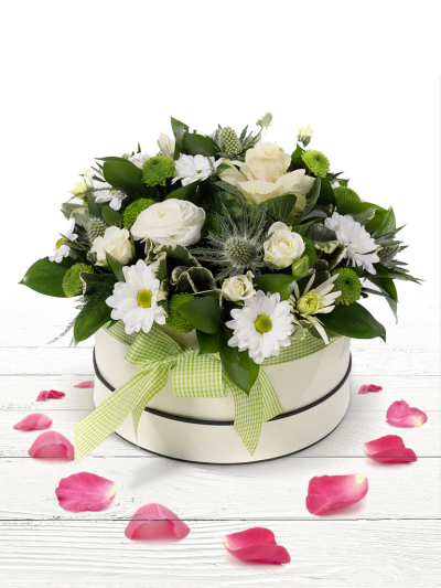 Olivia Hatbox - A stunning arrangement of luxurious flowers in a white & cream colourway. Made to impress in a stylish hatbox.

Please note: for seasonal and other supply reasons, we may occasionally substitute some of the blooms shown in the image. We will always try to be true to the bouquet's colour coordination, style, and shape and guarantee to give you the full value paid. If you have any queries, please email or call us and we would be delighted to confirm availability and explain alternatives. See the 'Contact Us' section.