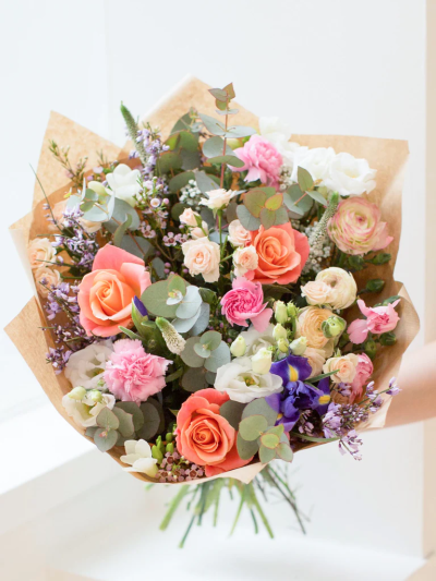 Mixed Bouquet - This beautifully designed hand-tied bouquet would make anybody happy! 

Featuring Rose, Lisianthus, Carnation, Thalaspie, Iris, Freesia, Spray rose with selected foliages.

The image shows Large Size

Please note: for seasonal and other supply reasons, we may occasionally substitute some of the blooms shown in the image. We will always try to be true to the bouquet's colour coordination, style, and shape and guarantee to give you the full value paid. If you have any queries, please email or call us and we would be delighted to confirm availability and explain alternatives. See the 'Contact Us' section.