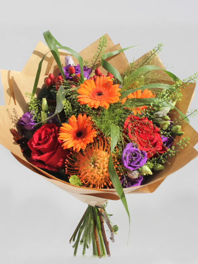 Crispy Clementine - The crispy season has started, beautiful berries, red and orange flowers give you that cosy feeling with this beautiful hand made flower bouquet created for you.

The image shows Large Size

Please note: for seasonal and other supply reasons, we may occasionally substitute some of the blooms shown in the image. We will always try to be true to the bouquet's colour coordination, style, and shape and guarantee to give you the full value paid. If you have any queries, please email or call us and we would be delighted to confirm availability and explain alternatives. See the 'Contact Us' section.