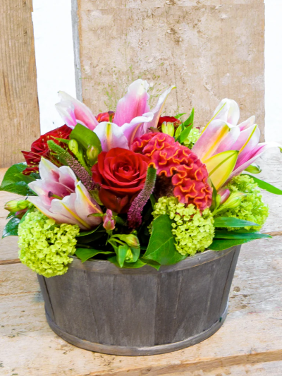 Red Rose and Lily Basket - A pretty collection of red & pink flowers skilfully arranged in a beautiful basket to send your message in a wonderful way.

Please note: for seasonal and other supply reasons, we may occasionally substitute some of the blooms shown in the image. We will always try to be true to the bouquet's colour coordination, style, and shape and guarantee to give you the full value paid. If you have any queries, please email or call us and we would be delighted to confirm availability and explain alternatives. See the 'Contact Us' section.