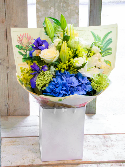Country Garden Bouquet - Just like a country garden in full bloom, this pretty hand-tied bouquet is bursting with colour, texture and variety. 

The image shows Large Size

Please note: for seasonal and other supply reasons, we may occasionally substitute some of the blooms shown in the image. We will always try to be true to the bouquet's colour coordination, style, and shape and guarantee to give you the full value paid. If you have any queries, please email or call us and we would be delighted to confirm availability and explain alternatives. See the 'Contact Us' section.