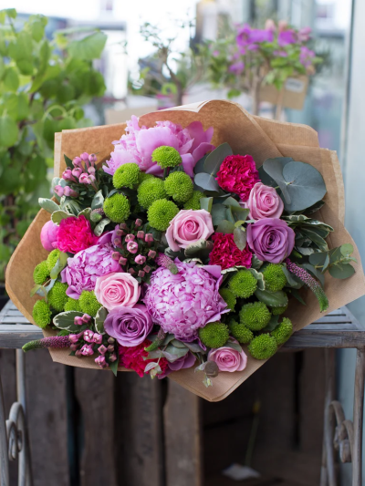 Heaven Scent - If pink is their favourite colour, then this pretty display of wonderfully feminine pink flowers is sure to impress. Hand-tied this bouquet contains scented pink peonies, pink and lilac roses mixed with bouvardia and soft green foliage. This is definitely a gift from heaven.

The image shows Large Size

Please note: for seasonal and other supply reasons, we may occasionally substitute some of the blooms shown in the image. We will always try to be true to the bouquet's colour coordination, style, and shape and guarantee to give you the full value paid. If you have any queries, please email or call us and we would be delighted to confirm availability and explain alternatives. See the 'Contact Us' section.