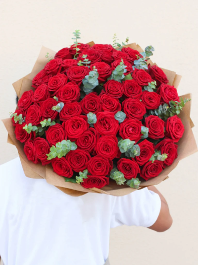 Total Love Red Roses - To express a love that knows no bounds, send a bouquet that's equally as limitless. This exquisite display is the perfect way to send your love to someone special. Beautifully arranged, wrapped and delivered in our signature bag with flower food and care instructions.