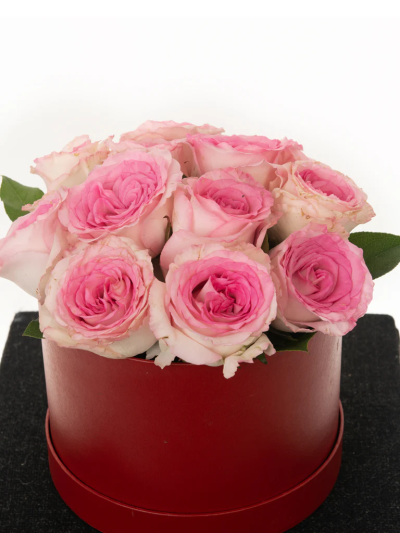 My Pink Hatbox - A stunning Hat Box, over-flowing with a charming pink roses. We do guarantee that your specific arrangement will be fresh, beautiful and that your recipient will love it!