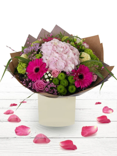 Mama Mia - This classical stylish collection of flowers make this hand tied the perfect gift. Professionally arranged and delivered by Go Dutch. Available for same-day delivery when ordered before 2 pm.

Fine Print: Pictures shown are recent examples of an actual arrangement that were designed by talented florists and later sent out to a customer just like you! Please note that each individual florist cannot guarantee what the flower varieties or colours will be, they do guarantee that your specific arrangement will be fresh, beautiful and that your recipient will love it!