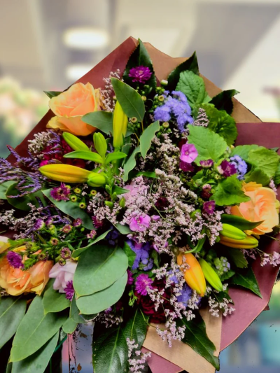 Red Forest Hand-tied - This is a truly spectacular combination of blooms. It’s a popular choice too - these flowers are firm favourites and work together beautifully. Simple, and very stylish, this hand-tied bouquet is a fabulous gift.

Please note for seasonal and other supply reasons we may, from time to time, substitute some of the blooms shown in the image. We will always try to be true to the colour coordination, style and shape of the bouquet and will always guarantee to give you the full value paid. If you have any queries, please email or call us and we would be delighted to confirm availability and/or explain alternatives. See the 'contact us' section.