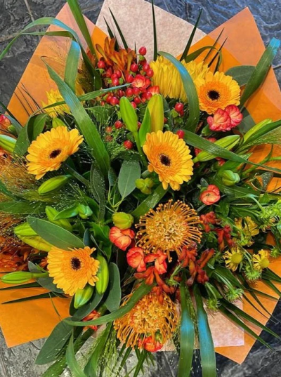 Autumn Allure Bouquet - This exclusive Floral Bouquet combines autumn with beautiful orange, yellow and red flowers. The freshness and quality show what our fresh flowers are known for.

The image shows Large Size

Please note: for seasonal and other supply reasons, we may occasionally substitute some of the blooms shown in the image. We will always try to be true to the bouquet's colour coordination, style, and shape and guarantee to give you the full value paid. If you have any queries, please email or call us and we would be delighted to confirm availability and explain alternatives. See the 'Contact Us' section.