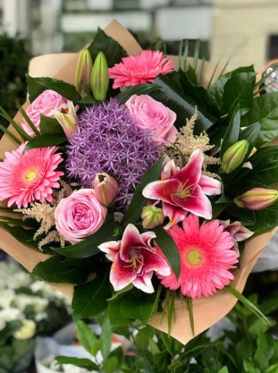 New Pink Lady - This beautifully designed hand-tied bouquet would make anybody happy! This is definitely a gift from heaven. 

The image shows Large Size

Please note: for seasonal and other supply reasons, we may occasionally substitute some of the blooms shown in the image. We will always try to be true to the bouquet's colour coordination, style, and shape and guarantee to give you the full value paid. If you have any queries, please email or call us and we would be delighted to confirm availability and explain alternatives. See the 'Contact Us' section.