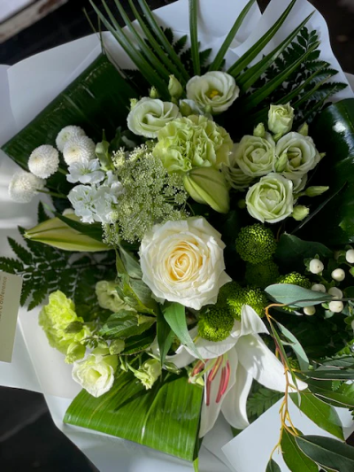 Beautiful White - This is a very elegant, contemporary hand-tied bouquet. Groups of crisp white flowers are beautifully framed by loops of greeneries. It’s simple in colour, but intricate in design, and the lilies give a sweet scent to the bouquet.

 

The image shows Large Size

Please note: for seasonal and other supply reasons, we may occasionally substitute some of the blooms shown in the image. We will always try to be true to the bouquet's colour coordination, style, and shape and guarantee to give you the full value paid. If you have any queries, please email or call us and we would be delighted to confirm availability and explain alternatives. See the 'Contact Us' section.